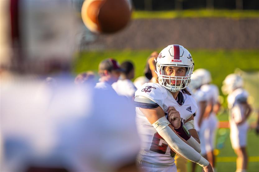 Student-athletes play football
